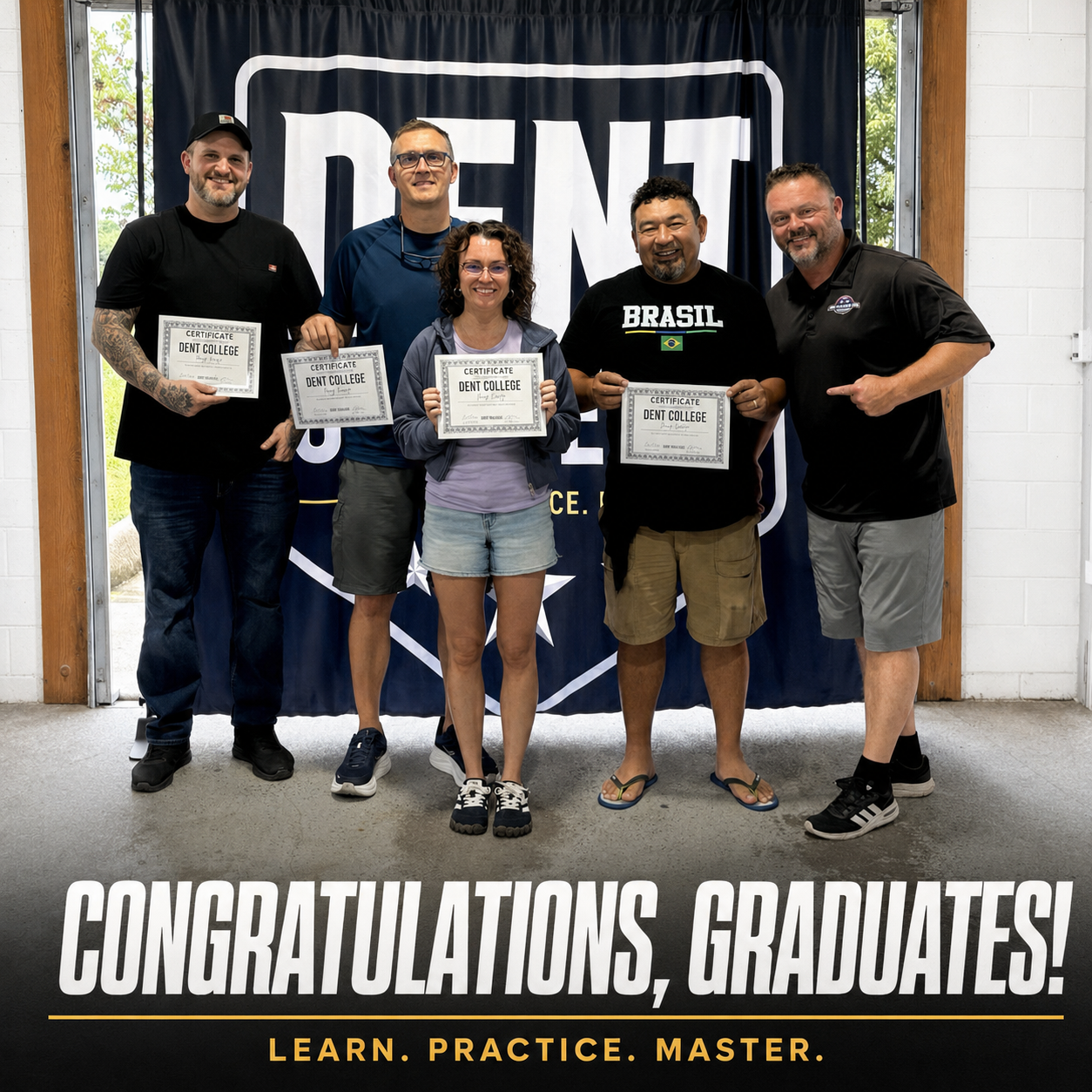 Dent College graduates holding their paintless dent repair completion certificates with instructor Jesse Hawe.